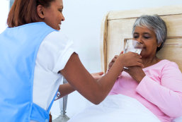 senior woman drinking milk